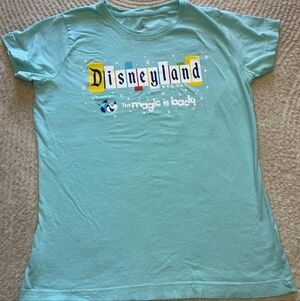 Disney Disneyland Resort The Magic is Back Light Blue Adult T-Shirt Size M